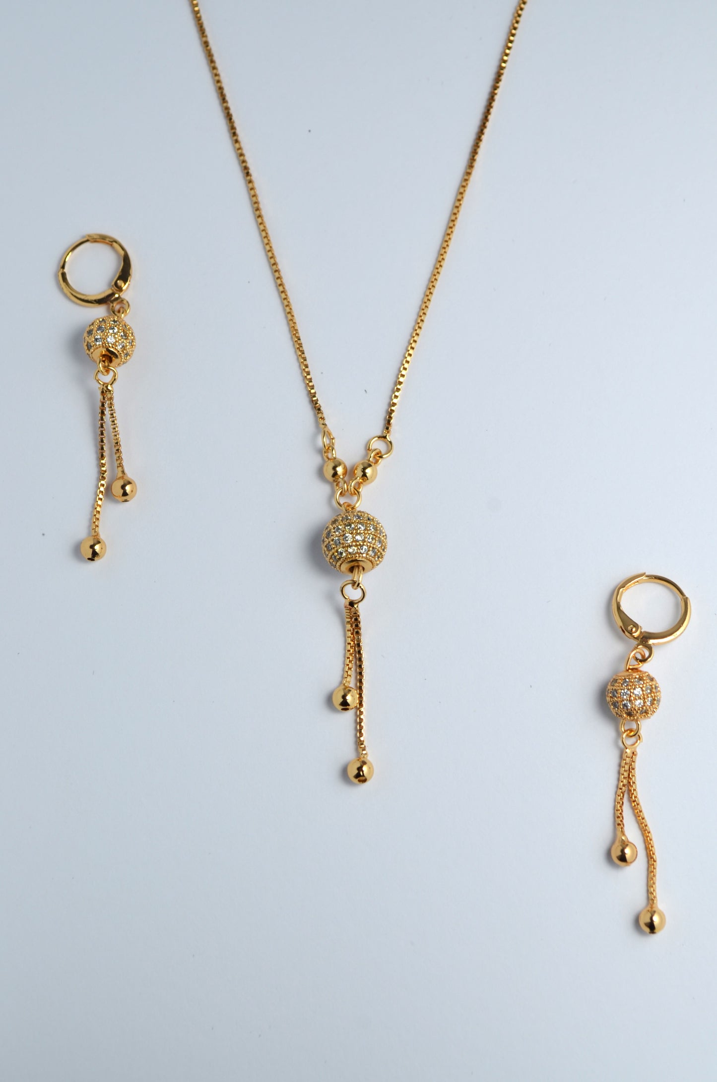 Cascading CZ Ball Drop Earrings and Necklace Set in Gold-Plated Stainless Steel